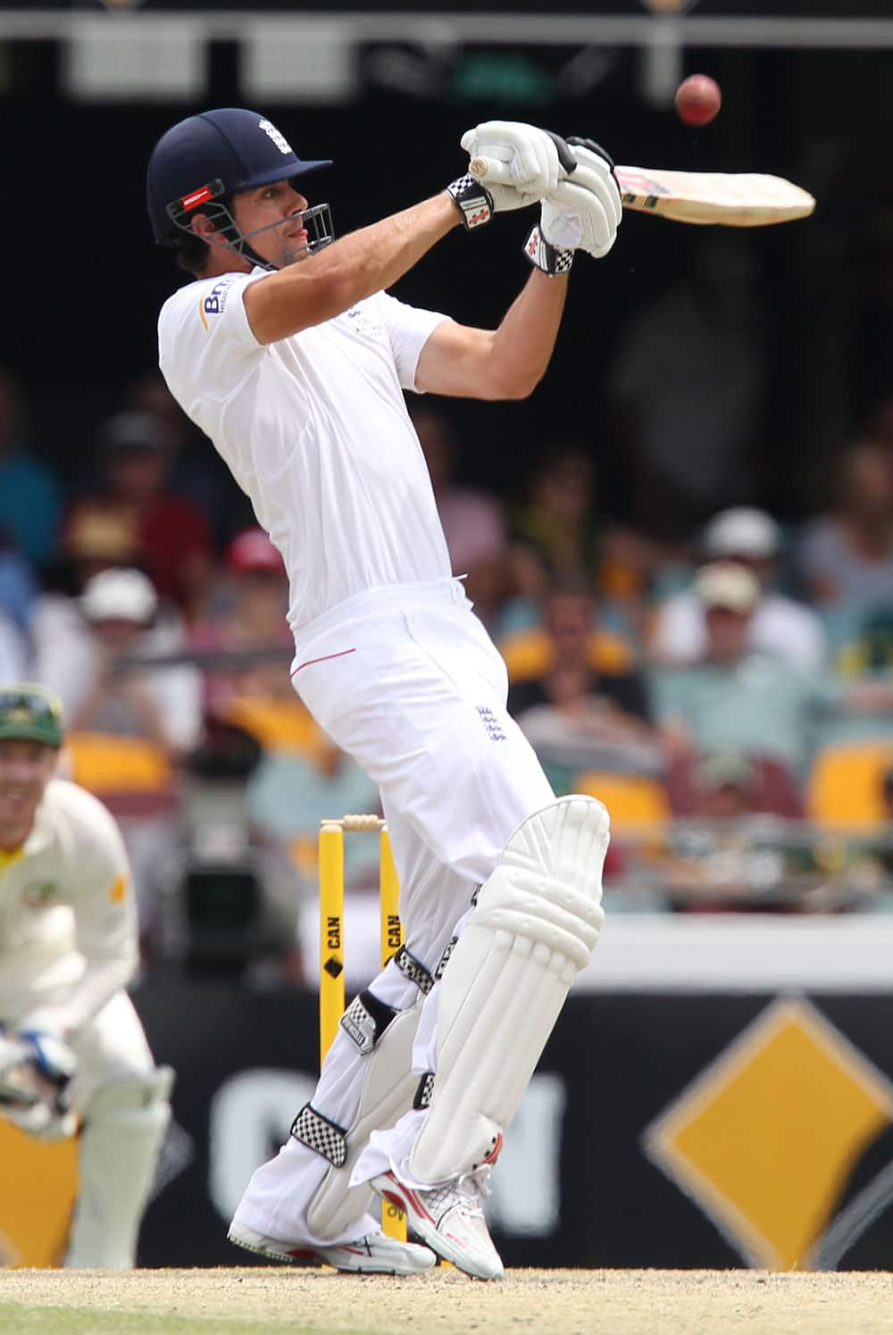 England's Alastair Cook plays a shot on the fourth day of the series-opening Ashes cricket test between England and Australia at the Gabba in Brisbane.