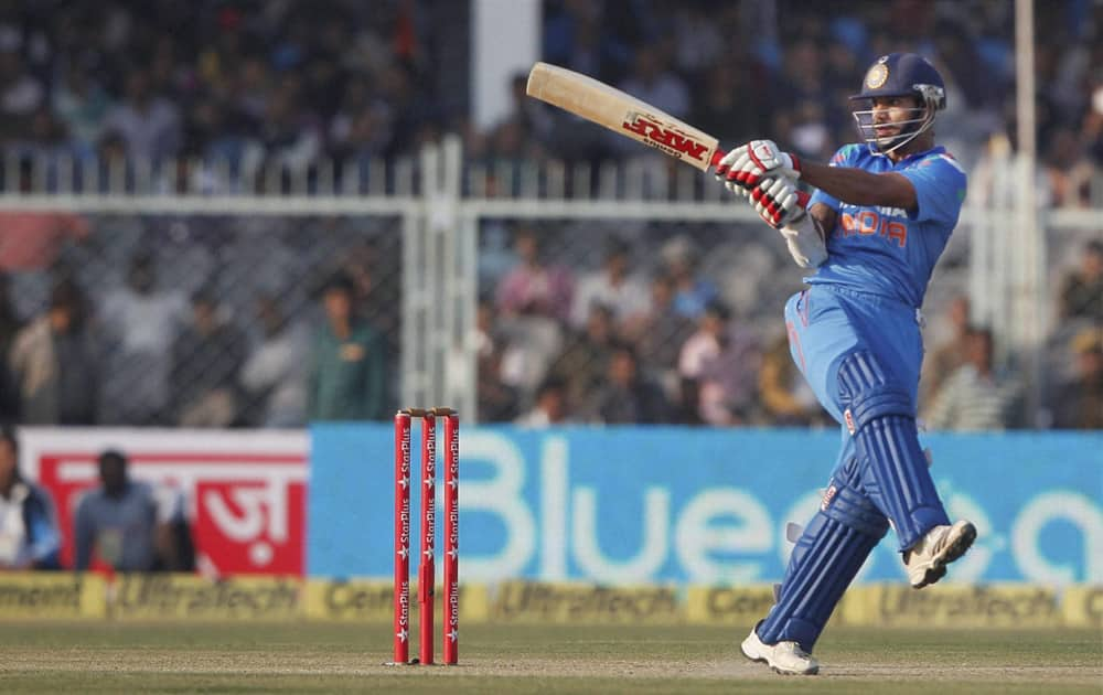 Shikhar Dhawan plays a shot during the last ODI match against West Indies at Green Park stadium in Kanpur.