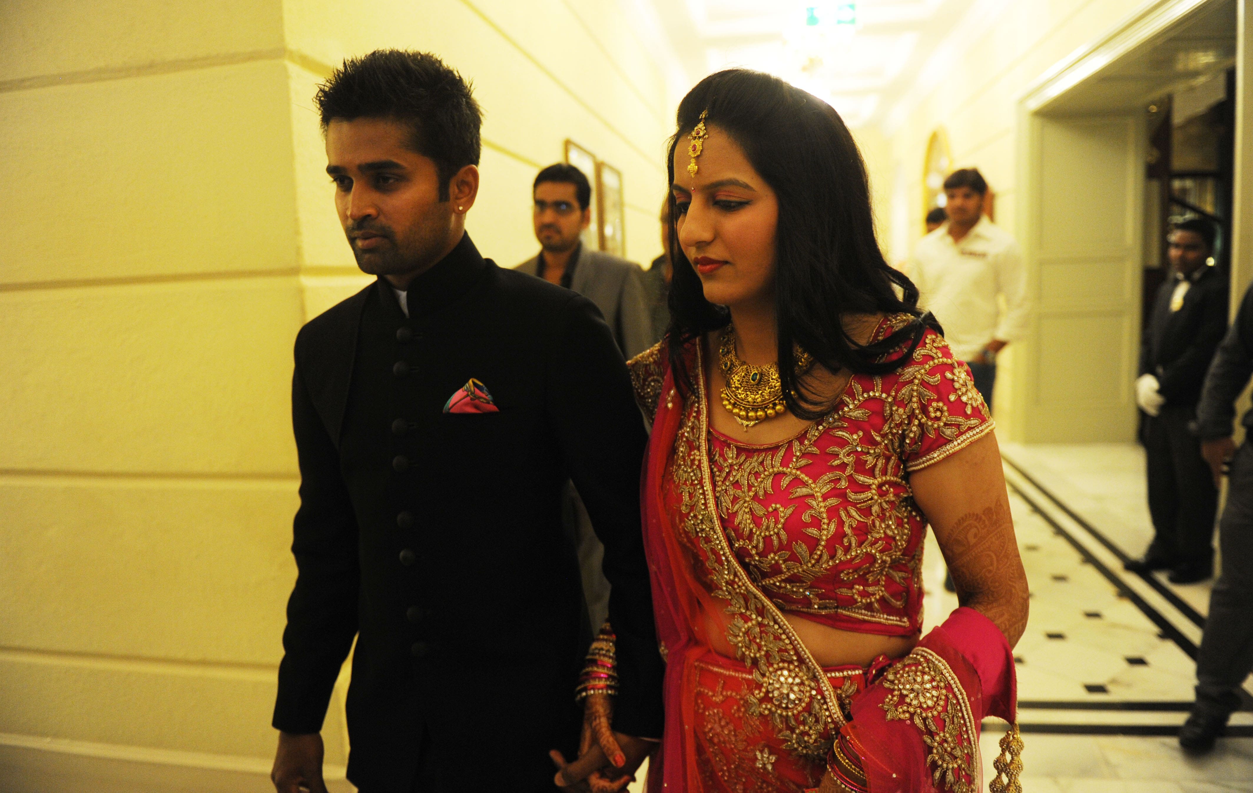 Vinay Kumar married to Richa yesterday arriving for their reception today at Windsor Manor hotel in Bangalore. Pic Courtesy: A Veeramani.DNA