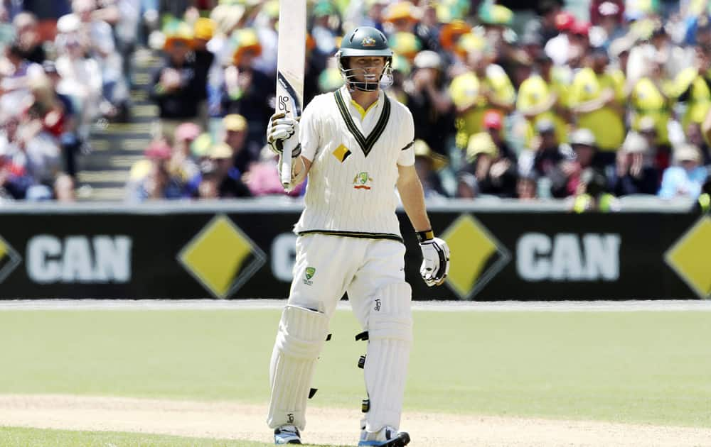 Chris Rogers celebrates his fifty during their second Ashes cricket test match against England in Adelaide, Australia.