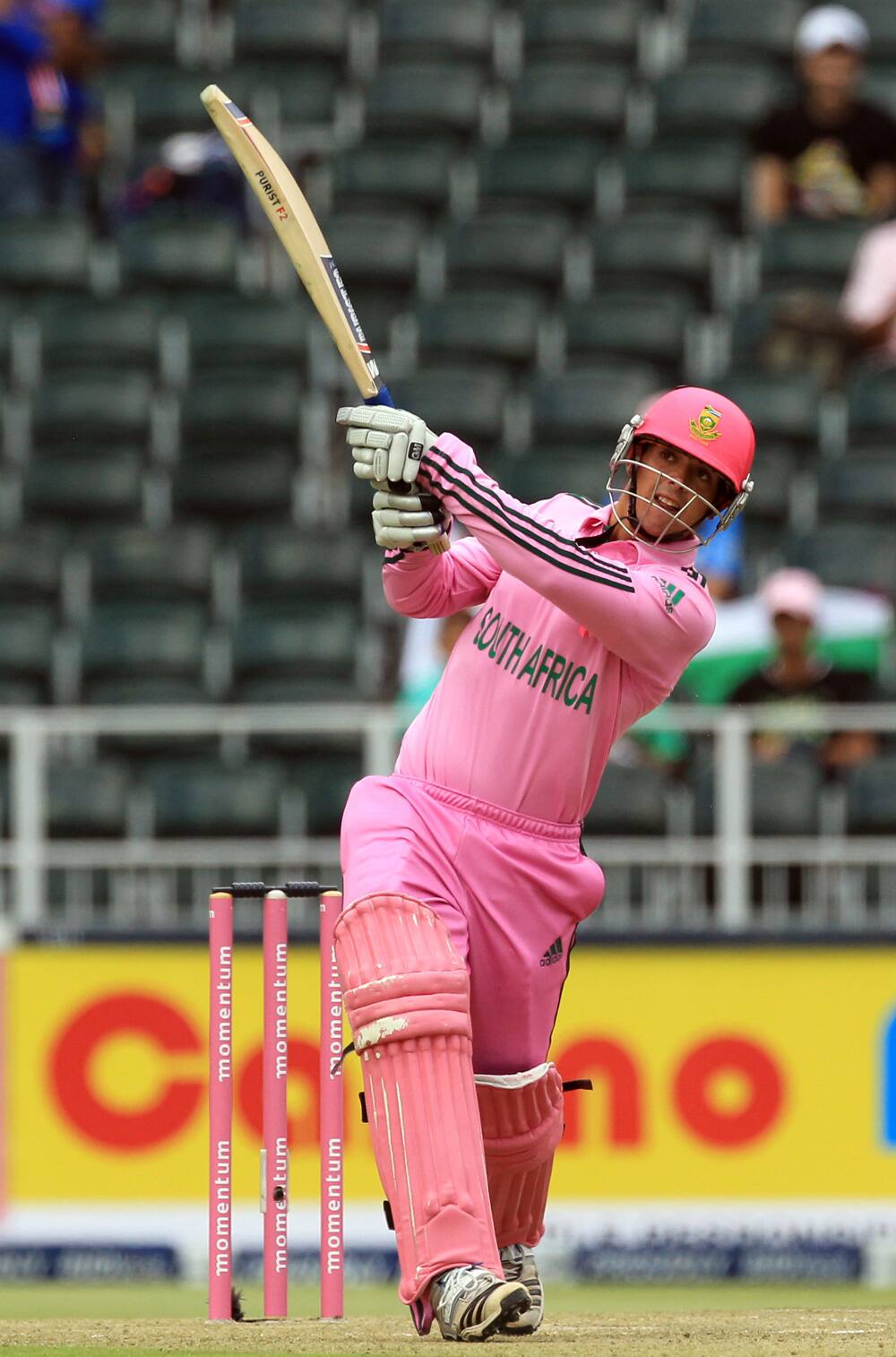South Africa's Quinton de Kock, watches the flight of the ball going for a six during their 1st One Day International cricket match against India at Wanderers stadium in Johannesburg, South Africa.