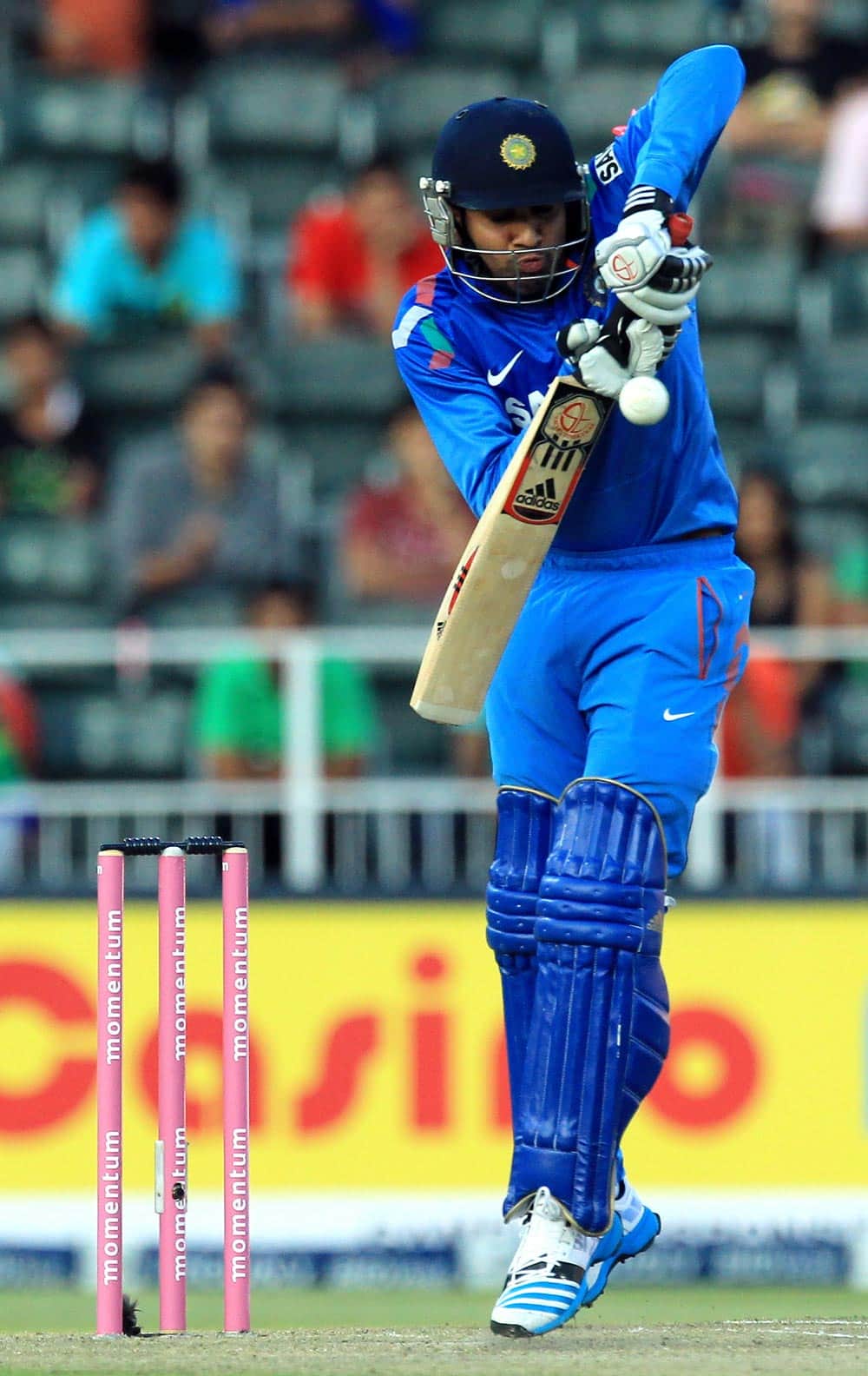 India's batsman Rohit Sharma, plays a short ball off South Africa's bowler Morne Morkel, during their 1st One Day International cricket match at Wanderers stadium in Johannesburg, South Africa.