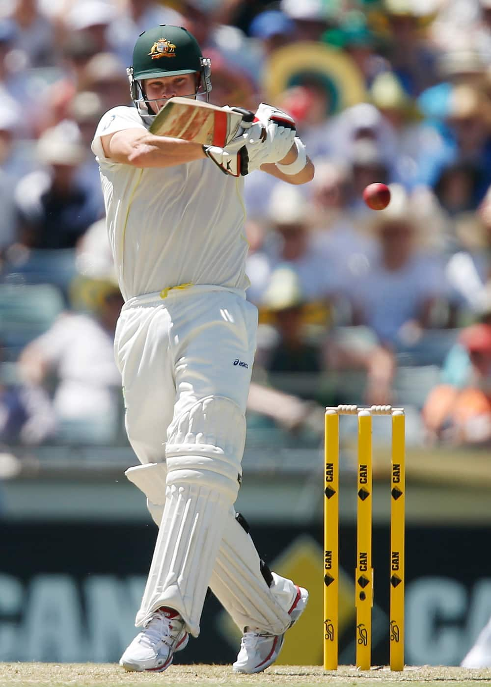 Australia's Steve Smith plays a hook shot against England on the first day of their Ashes cricket test match in Perth, Australia.