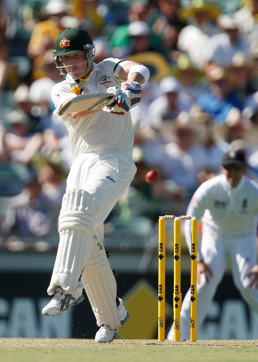 Australia's Brad Haddin plays a pull shot on the first day of play during the Ashes test match against England in Perth, Australia.