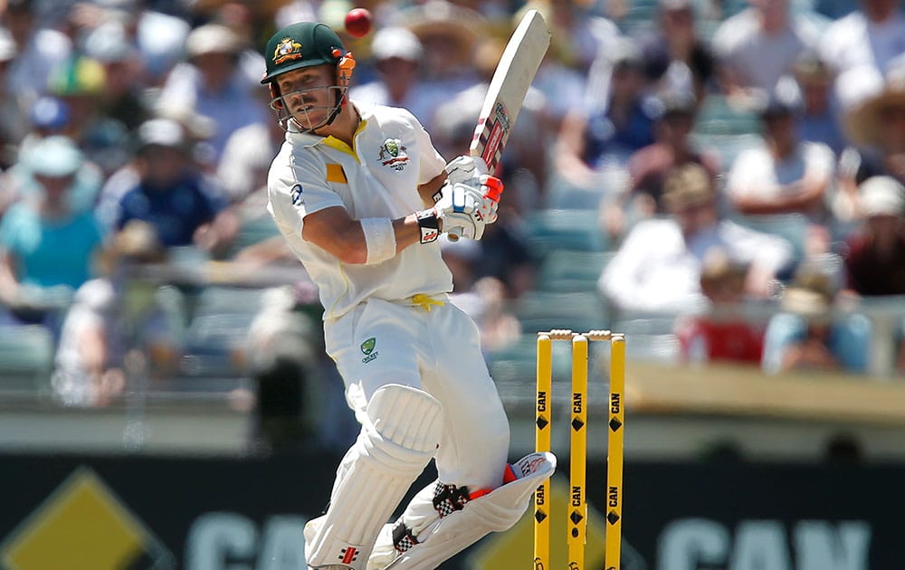 Australia's Dave Warner ducks from a short pitch ball during Australia's second innings on the third day of their Ashes cricket test match against England in Perth, Australia.