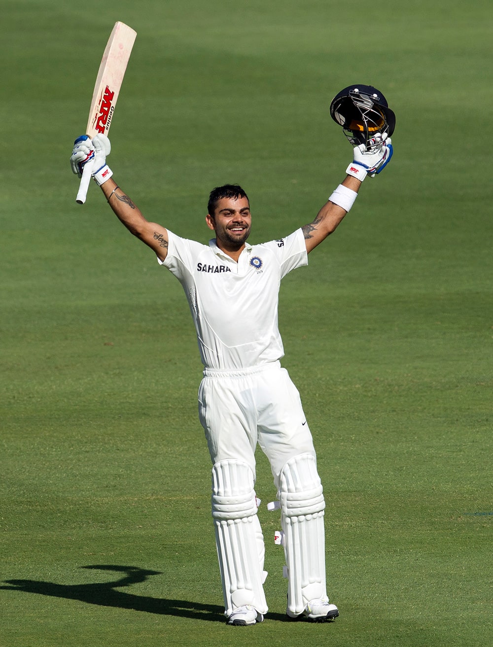 Virat Kohli celebrates his century during the first day of their cricket test match against South Africa at Wanderers stadium in Johannesburg, South Africa.