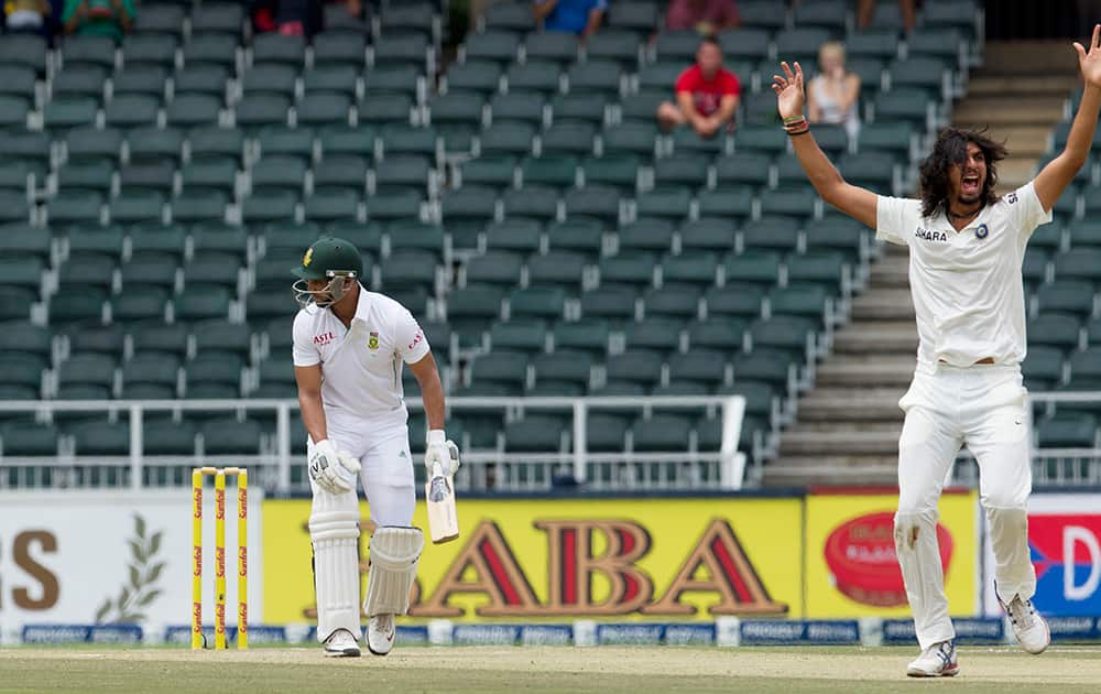 South Africa's batsman Alviro Petersen leaves the crease after being dismissed by India's bowler Ishant Sharma during the second day of their cricket test match at Wanderers stadium in Johannesburg, South Africa.