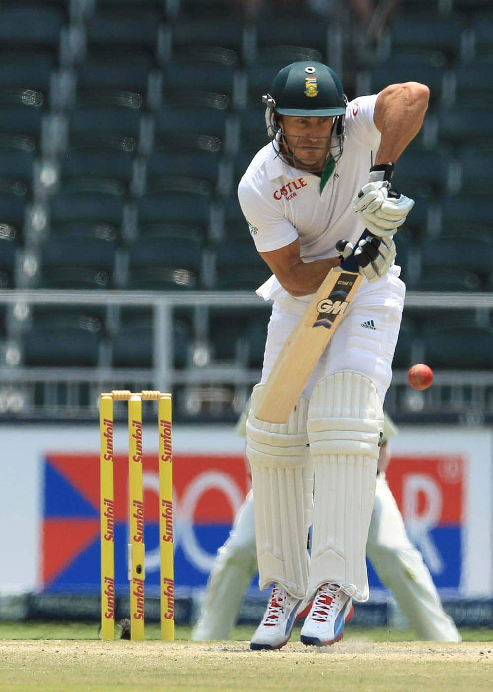 South Africa's batsman Francois du Plessis plays a side shot during the fourth and final day of their cricket test match against India at Wanderers stadium in Johannesburg, South Africa.