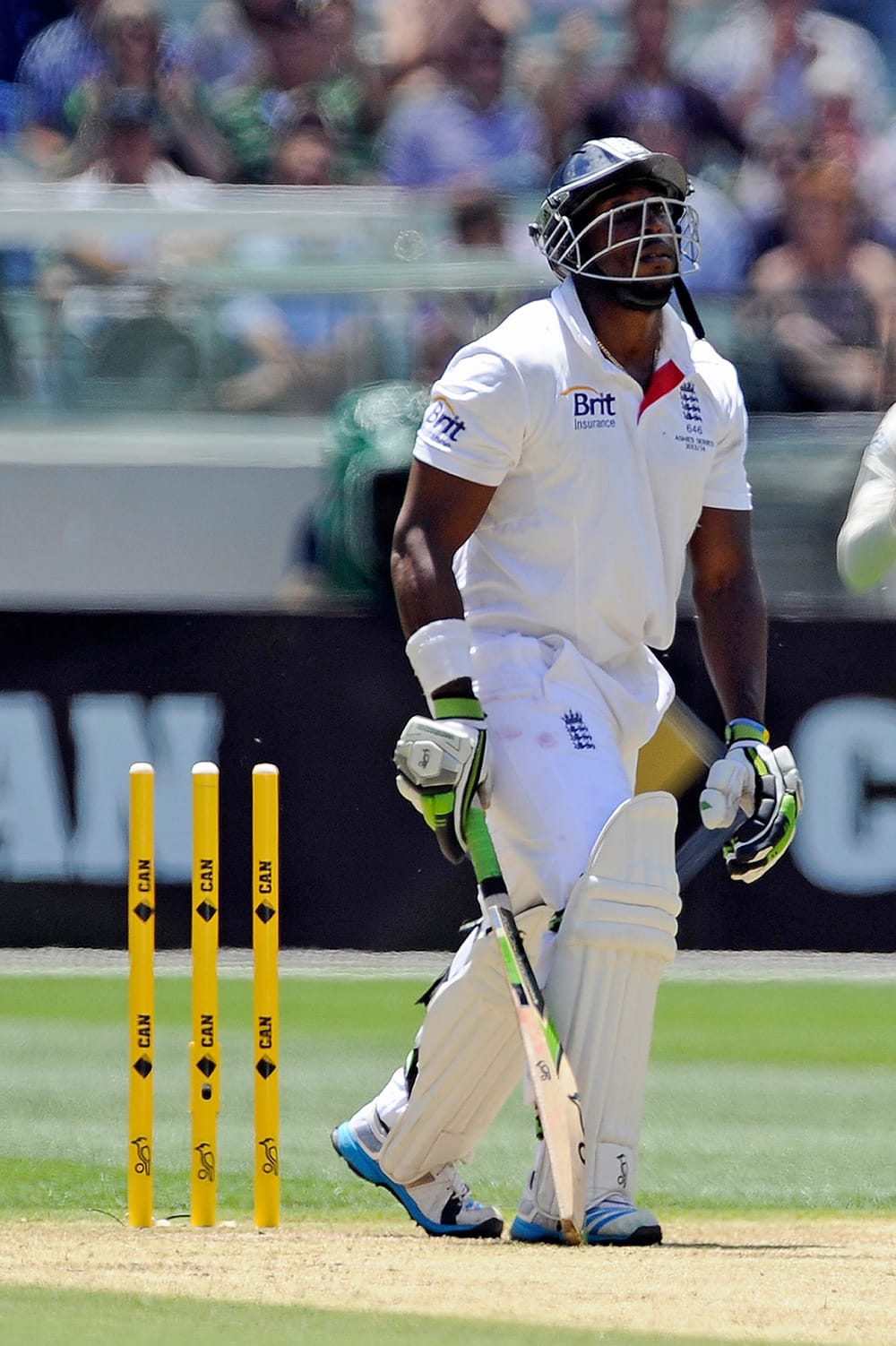 England's Michael Carberry looks up after being bowled by Australia's Shane Watson on the first day of their Ashes cricket test match at the Melbourne Cricket Ground in Melbourne, Australia.