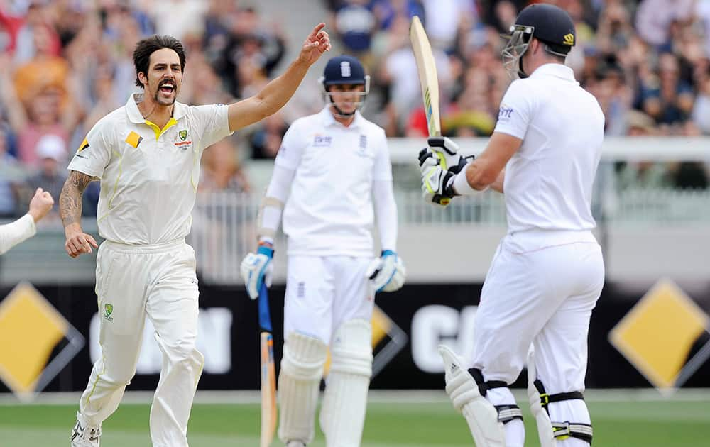 England's Kevin Pietersen is bowled out by Australia's Mitchell Johnson for 71 runs on the second day of their fourth Ashes cricket test match at the Melbourne Cricket Ground in Melbourne, Australia.