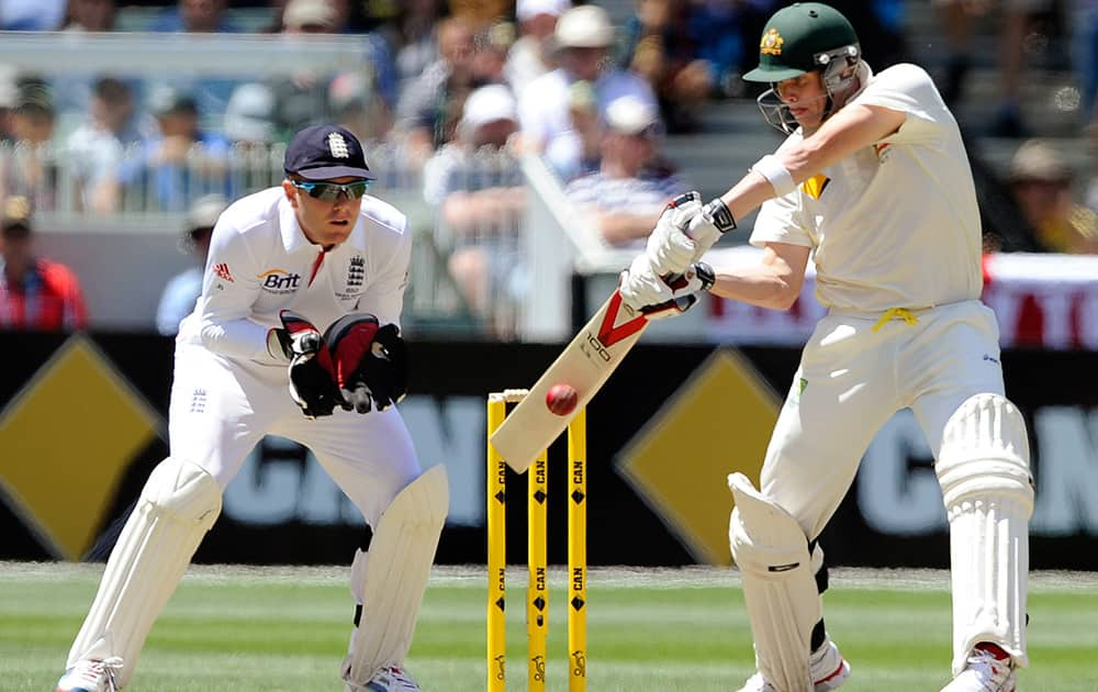 England's Jonny Bairstow is set as Australia's Steve Smith plays a shot during their Ashes cricket test match at the Melbourne Cricket Ground in Melbourne, Australia. 