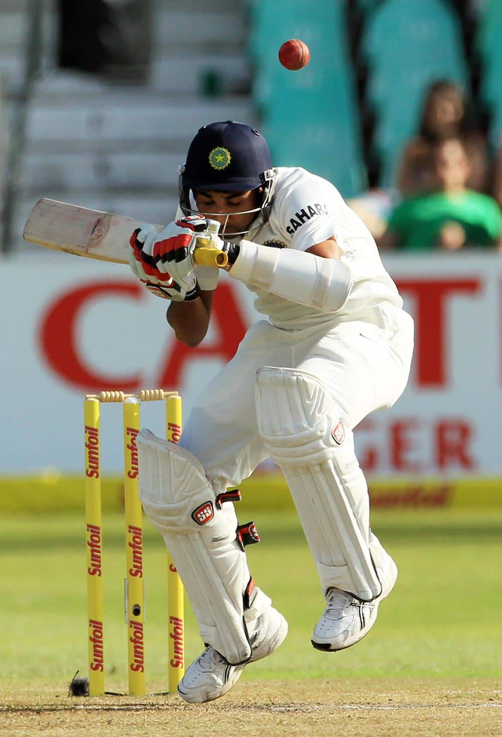 Mohammad Shami avoids a bouncer during the second day of their cricket test match against South Africa at Kingsmead stadium, Durban.