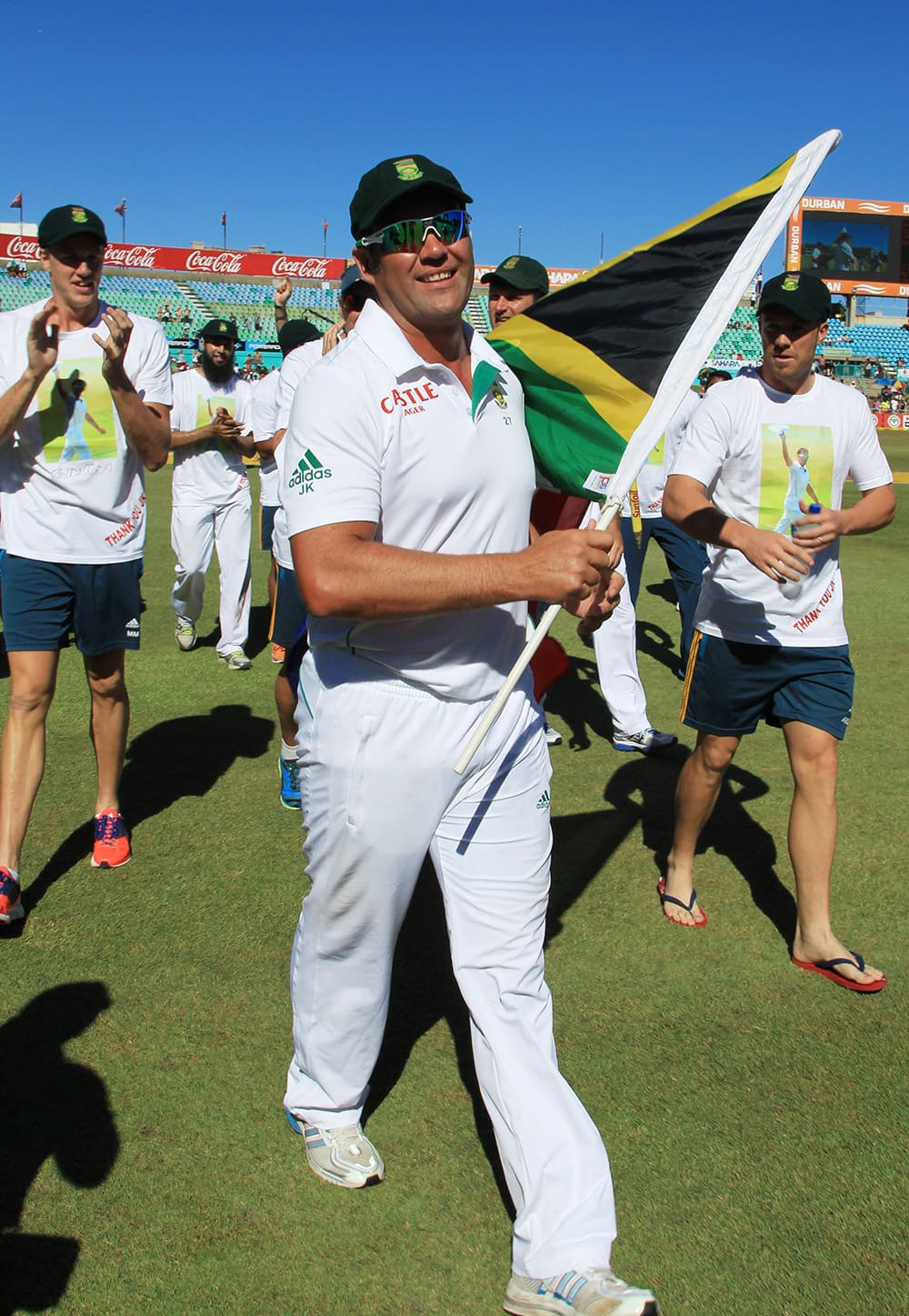 South Africa's bowler Jacques Kallis and teammates walk around the ground after he retired from Test cricket at end of the fifth and final day of their cricket test match against India at Kingsmead stadium, Durban.