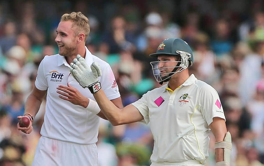 Australia's Ryan Harris and England's Stuart Broad chat during their Ashes cricket test match in Sydney.