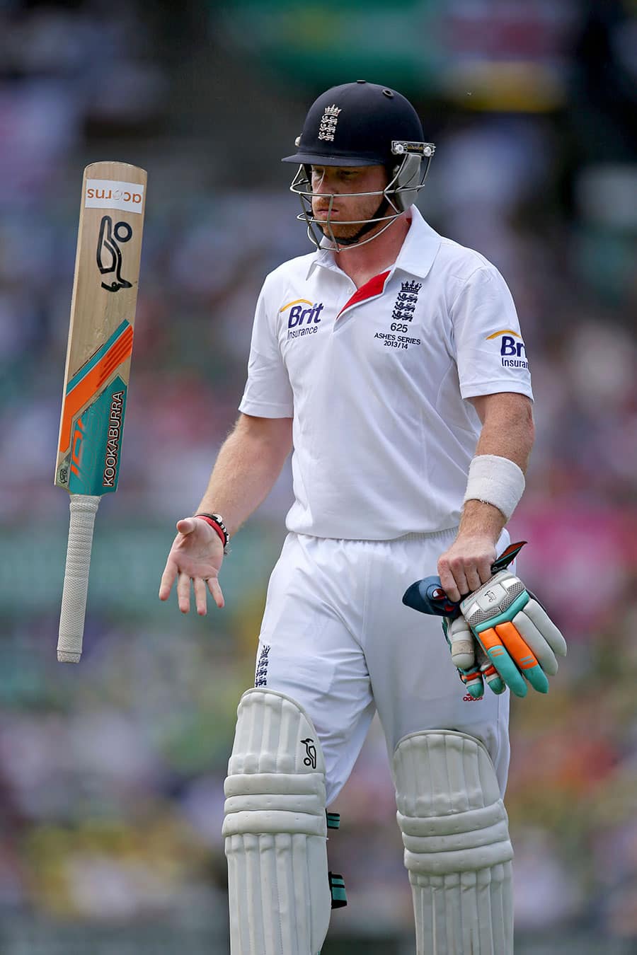 England's Ian Bell tosses his bat after he was caught out for 2 runs against Australia during their Ashes cricket test match at the Sydney Cricket Ground in Sydney.