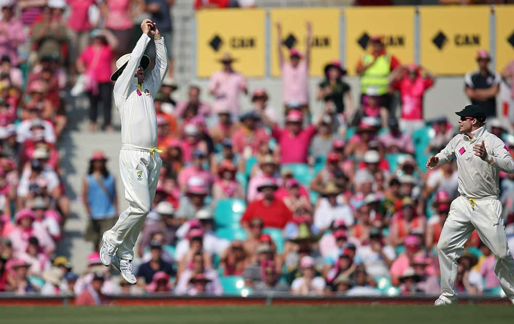 Australian captain Michael Clarke makes the last catch for victory over England on day 3 of their Ashes cricket test match at the Sydney Cricket Ground in Sydney.