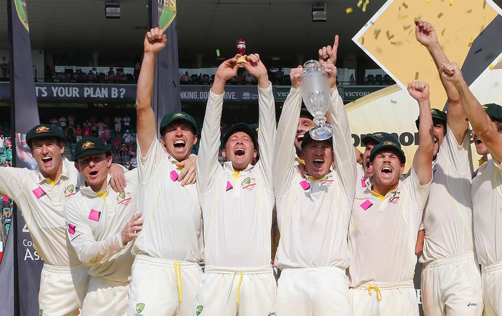 Australian players celebrates after winning the Ashes Cricket series against England in Sydney. Australia won the series 5-0. 