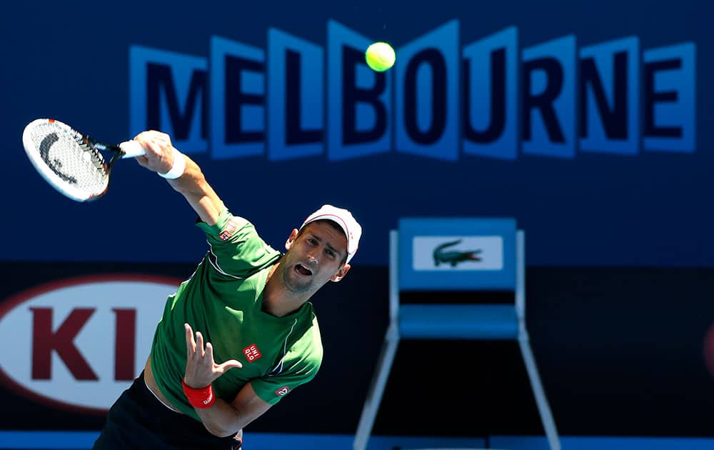 Novak Djokovic of Serbia serves during a training session ahead of the Australian Open tennis championship.