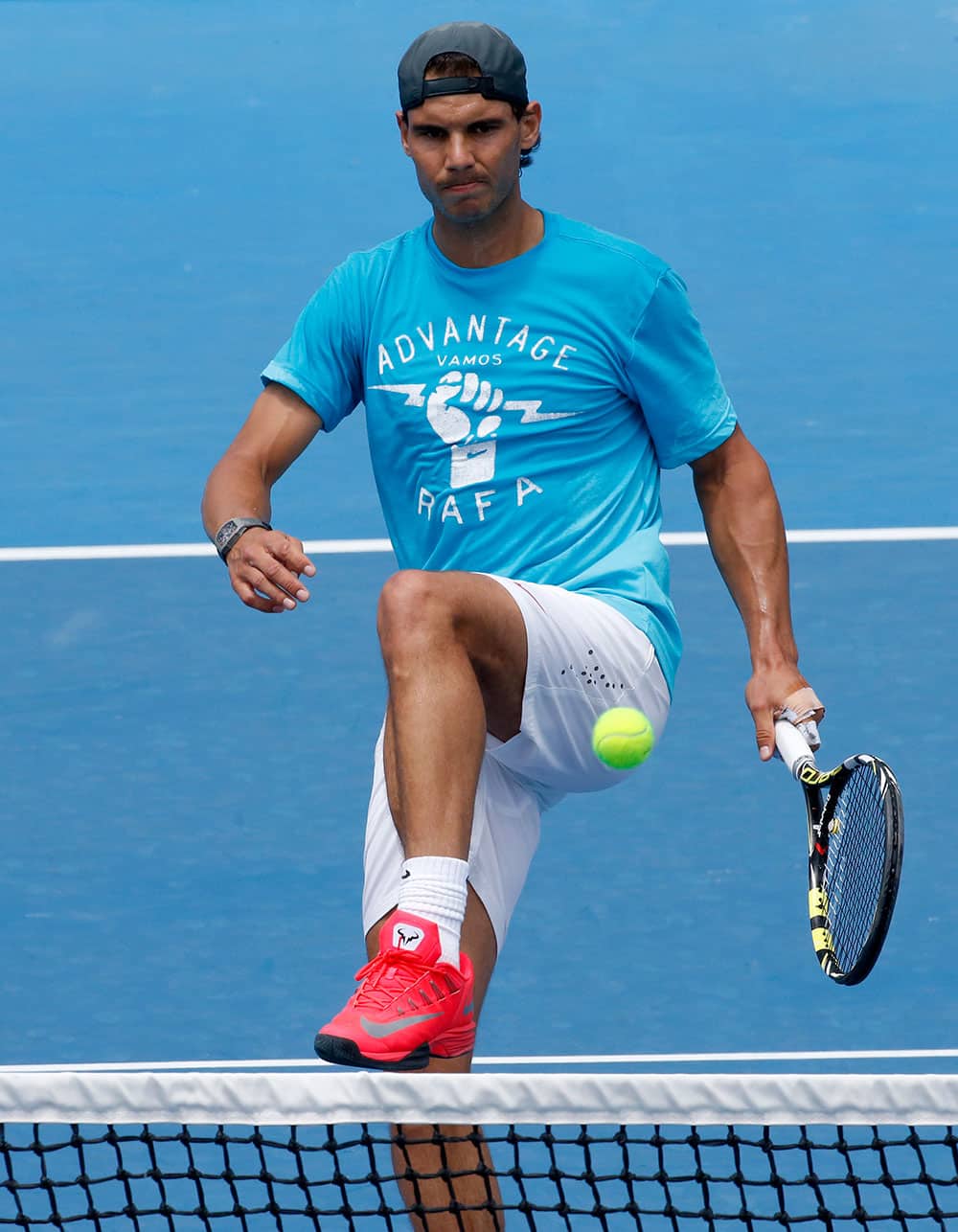 Rafael Nadal of Spain kicks the ball during a practice session ahead of the Australian Open tennis championship.
