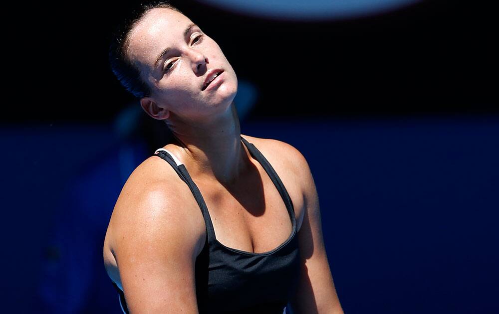 Jarmila Gajdosova of Australia reacts to a lost point against Angelique Kerber of Germany during their first round match at the Australian Open tennis championship in Melbourne.