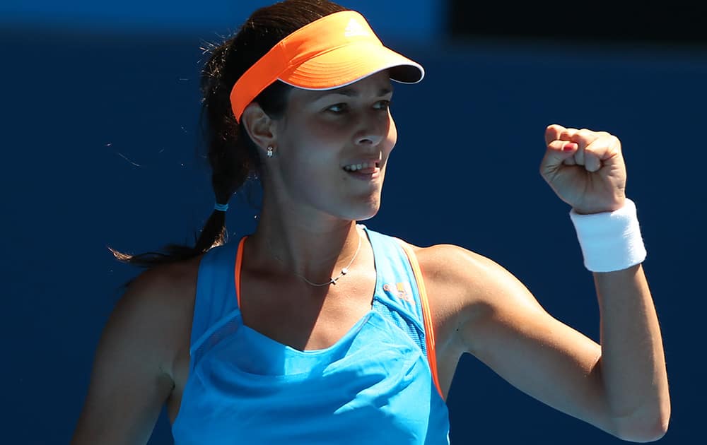 Ana Ivanovic of Serbia reacts after winning a point against Kiki Bertens of the Netherlands during their first round match at the Australian Open tennis championship in Melbourne, Australia.