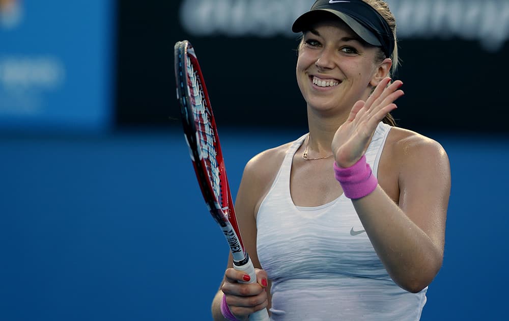 Sabine Lisicki of Germany celebrates after defeating Mirjana Lucic-Baroni of Croatia in their first round match at the Australian Open tennis championship in Melbourne, Australia.