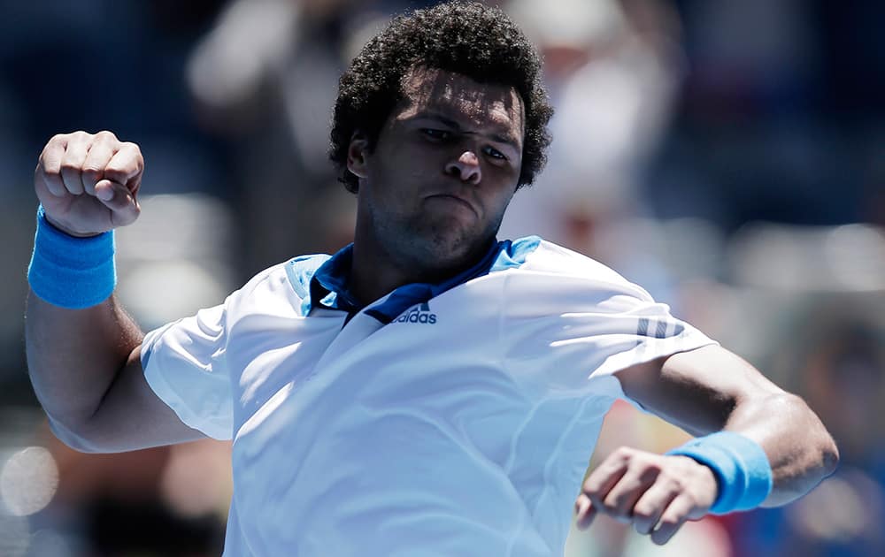 Jo-Wilfried Tsonga of France celebrates after defeating Filippo Volandri of Italy in their first round match at the Australian Open tennis championship in Melbourne, Australia.