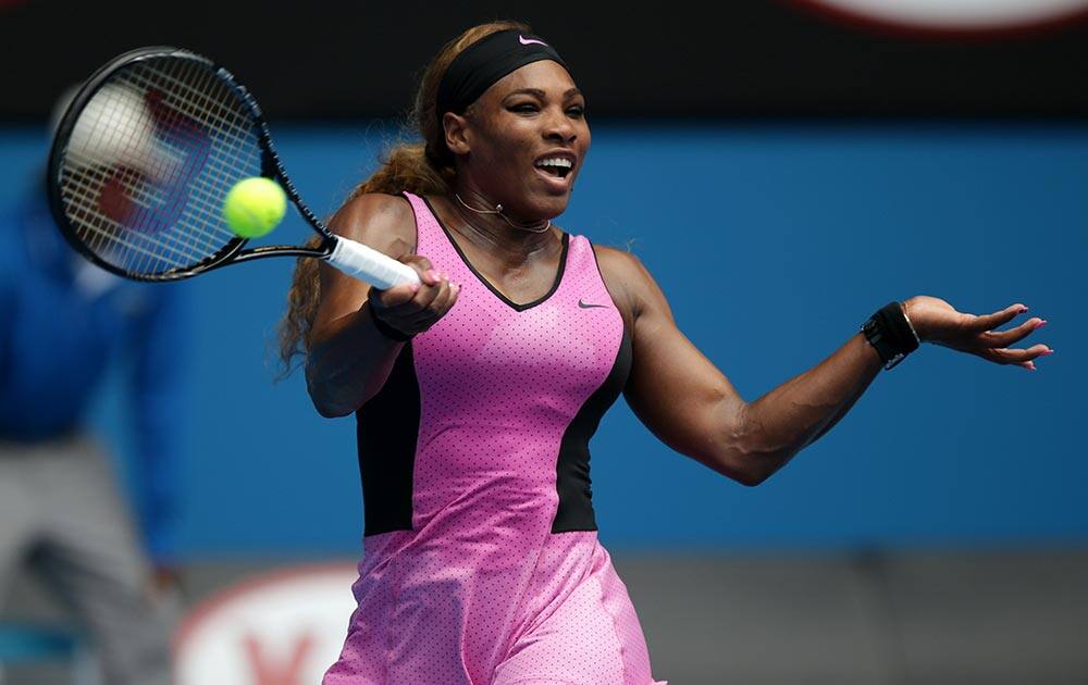 Serena Williams of the United States makes a forehand return to Vesna Dolonc of Serbia during their second round match at the Australian Open tennis championship in Melbourne.