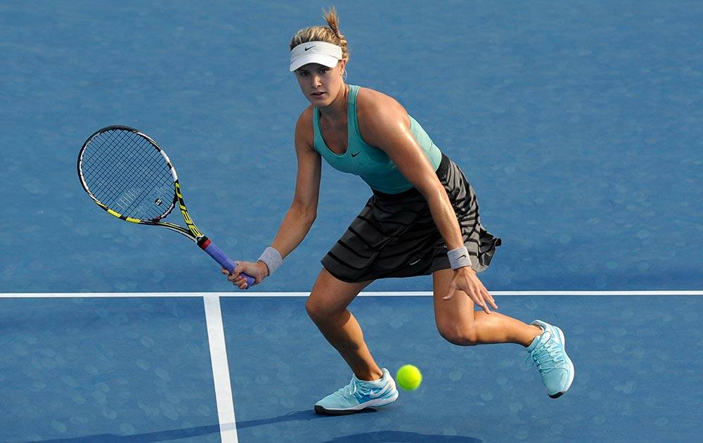 Eugenie Bouchard of Canada eyes the ball to return to Virginie Razzano of France during their second round match at the Australian Open tennis championship in Melbourne, Australia.