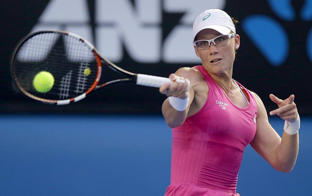 Samantha Stosur of Australia makes a forehand return to Tsvetana Pironkova of Bulgaria during their second round match at the Australian Open tennis championship in Melbourne, Australia.