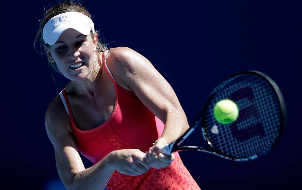Olivia Rogowska of Australia hits a backhand return to Elina Svitolina of Ukraine during their second round match at the Australian Open tennis championship in Melbourne, Australia.