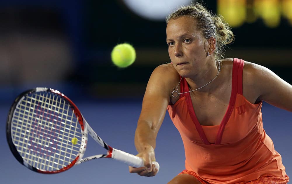 Barbora Zahlavova Strycova of the Czech Republic makes a forehand return to Victoria Azarenka of Belarus during their second round match at the Australian Open tennis championship in Melbourne, Australia.