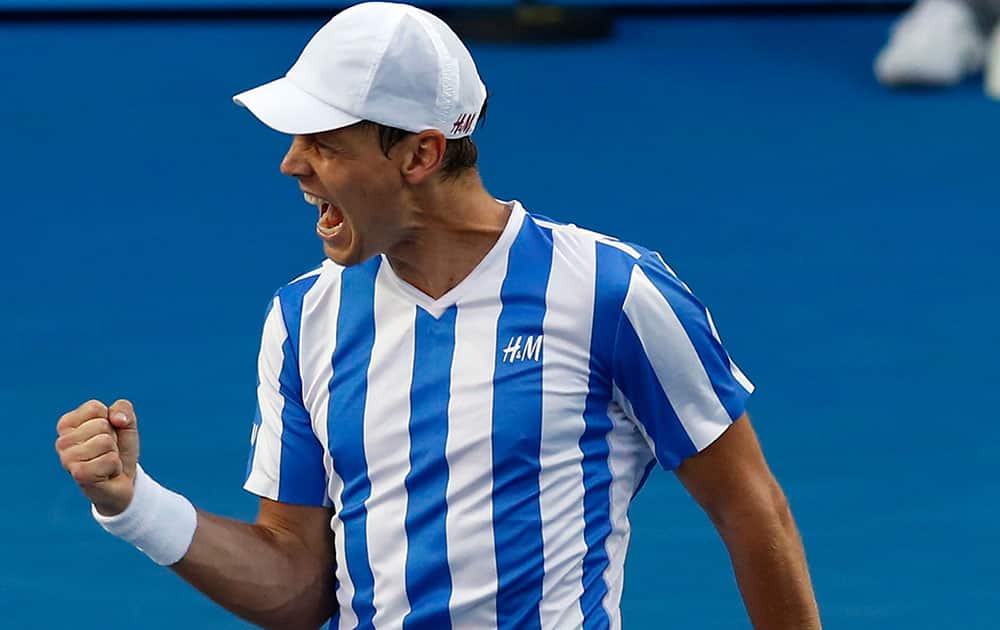 Tomas Berdych of the Czech Republic celebrates after his win over Kevin Anderson of South Africa during their fourth round match at the Australian Open tennis championship in Melbourne.