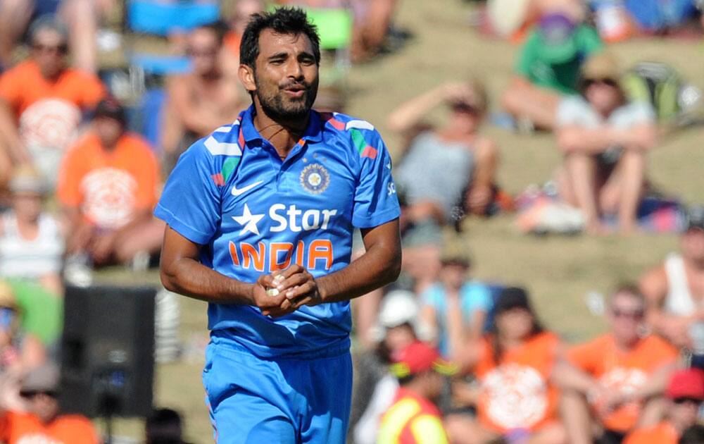 Mohammed Shami takes a caught and bowled to dismiss New Zealand's Nathan McCullum in their first one day international cricket match at McLean Park in Napier.