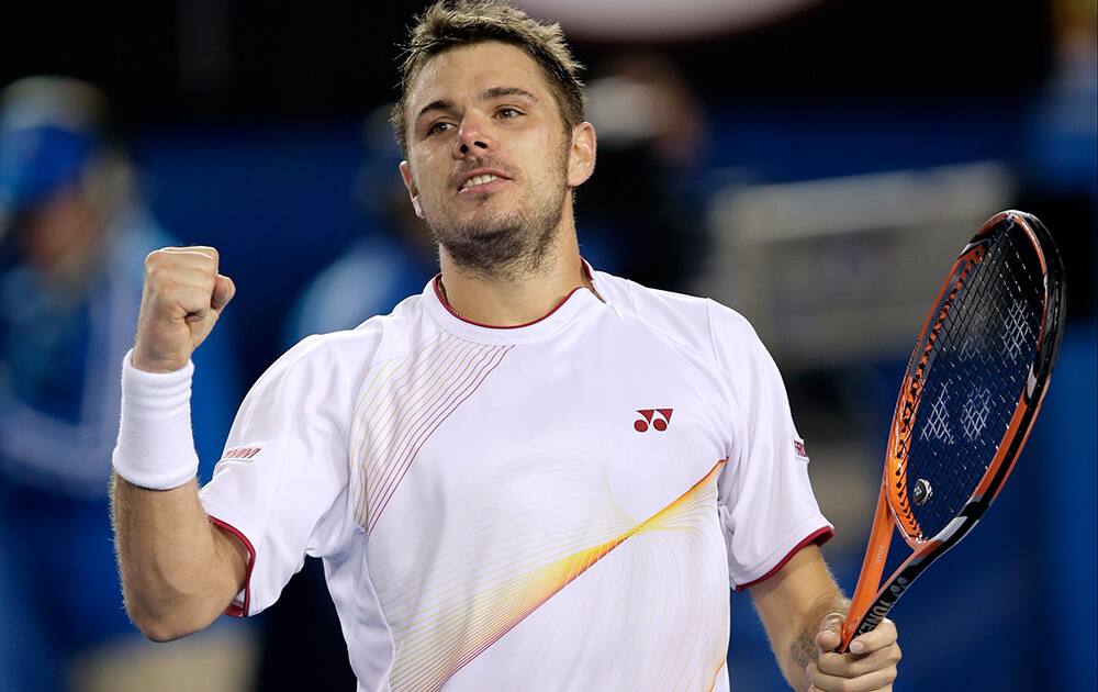 Stanislas Wawrinka of Switzerland celebrates after defeating Novak Djokovic of Serbia in their quarterfinal at the Australian Open tennis championship in Melbourne, Australia.