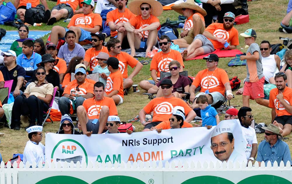 Supporters of an Indian political party use a cricket match between New Zealand and India to promote their cause, at Seddon Park in Hamilton, New Zealand.