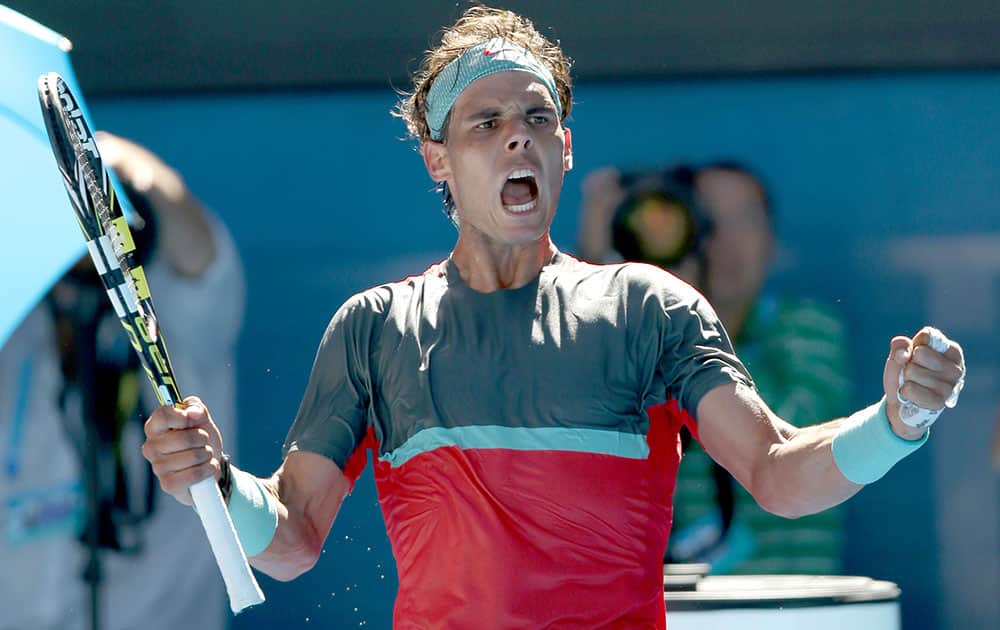 Rafael Nadal of Spain reacts after winning a point against Grigor Dimitrov of Bulgaria during their quarterfinal at the Australian Open tennis championship in Melbourne, Australia.