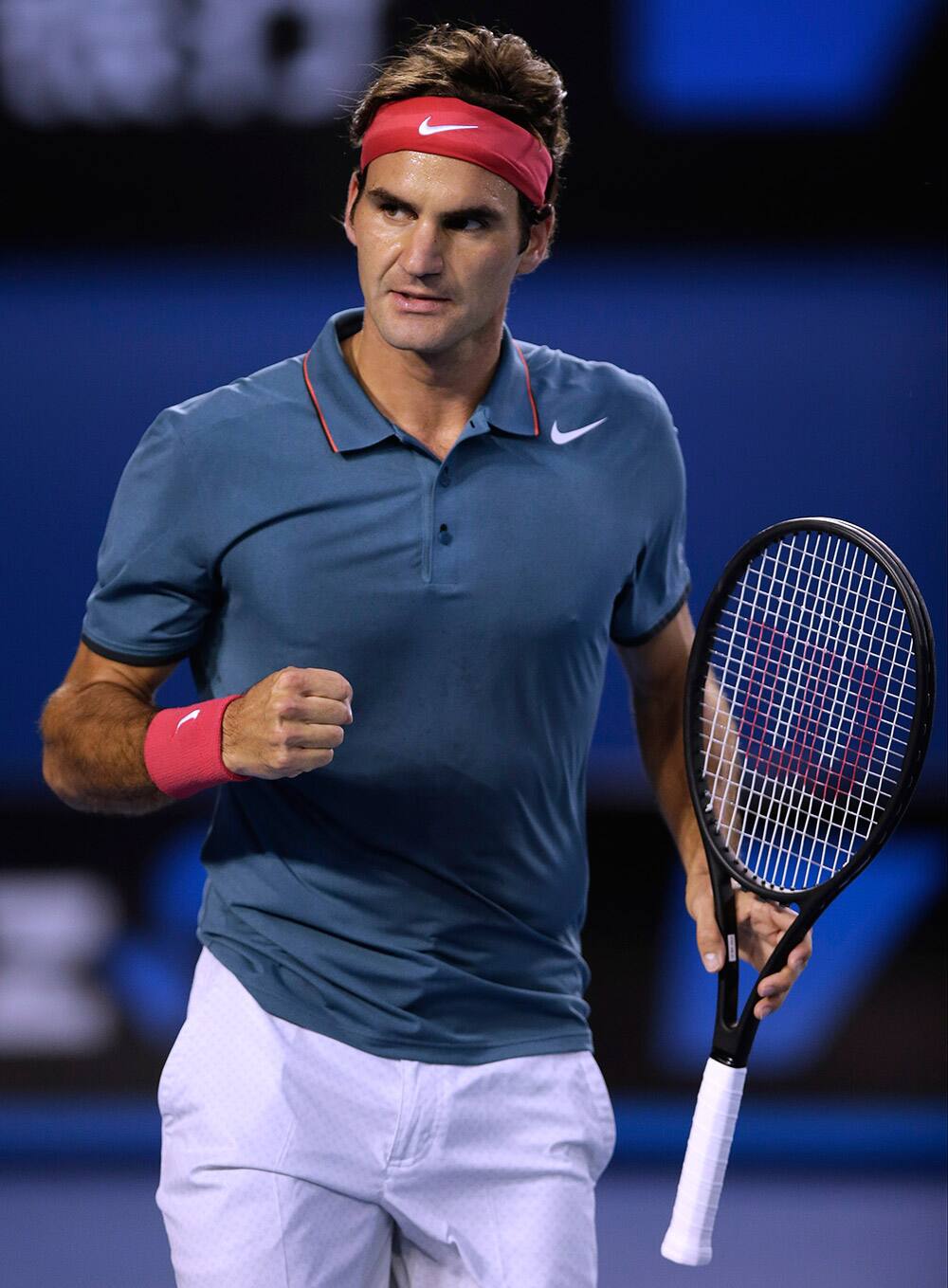 Roger Federer of Switzerland celebrates a point won against Rafael Nadal of Spain during their semifinal at the Australian Open tennis championship in Melbourne.