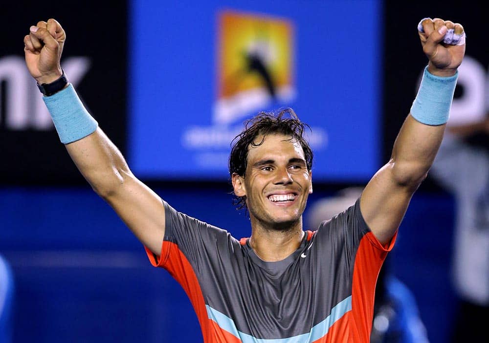 Rafael Nadal of Spain celebrates after defeating Roger Federer of Switzerland during their semifinal at the Australian Open tennis championship in Melbourne.