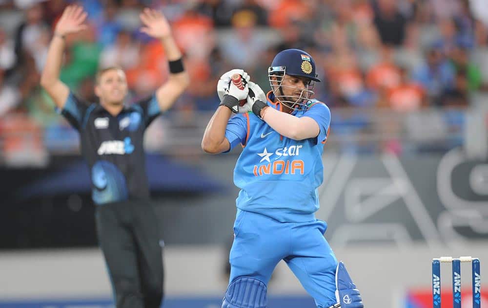 Suresh Raina out to New Zealand's Tim Southee for 39 during the third one day International cricket match at Eden Park in Auckland, New Zealand.