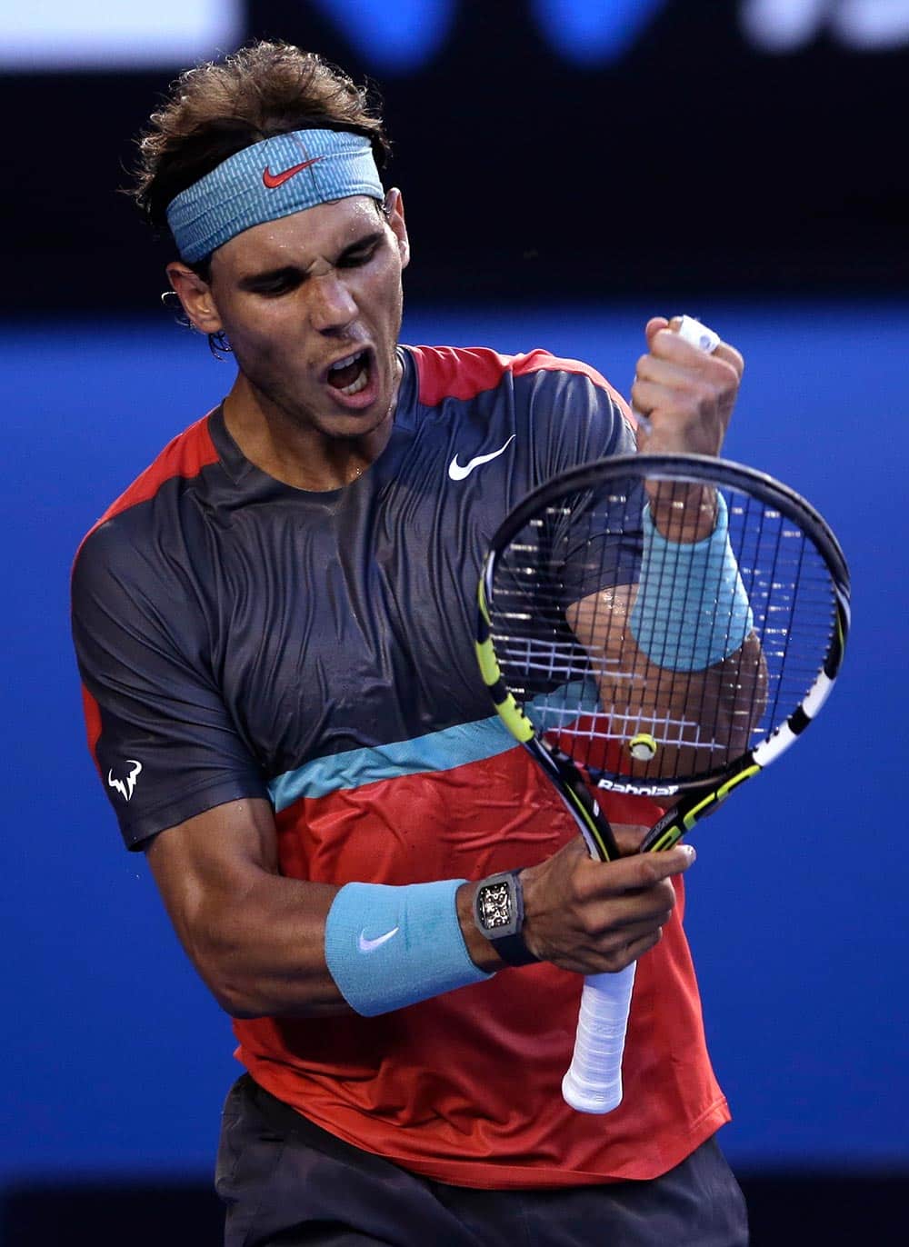 Rafael Nadal of Spain celebrates a point won against Stanislas Wawrinka of Switzerland during the men's singles final at the Australian Open tennis championship in Melbourne.