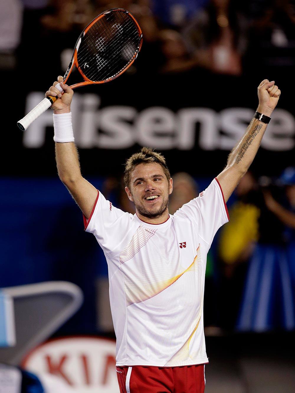Stanislas Wawrinka of Switzerland celebrates after defeating Rafael Nadal of Spain in the men's singles final at the Australian Open tennis championship in Melbourne, Australia.