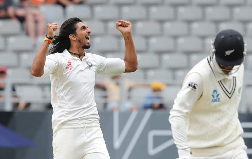 India’s Ishant Sharma celebrates his five wicket bag with the dismissal of New Zealand’s Ish Sodhi for 23 on the second day of the first cricket test at Eden Park in Auckland, New Zealand.