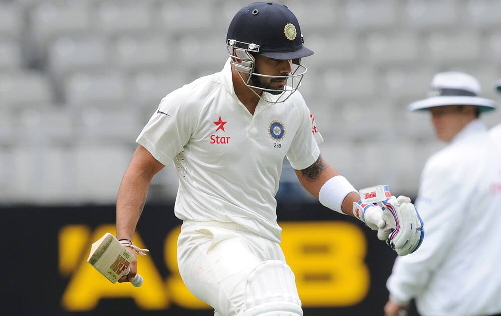 India’s Virat Kohli shows his disgust at being dismissed for 4 by New Zealand’s Tim Southee on the second day of the first cricket test at Eden Park in Auckland, New Zealand.