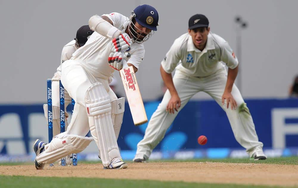 Shikar Dhawan bats against New Zealand on the third day of the first cricket test at Eden Park in Auckland, New Zealand.
