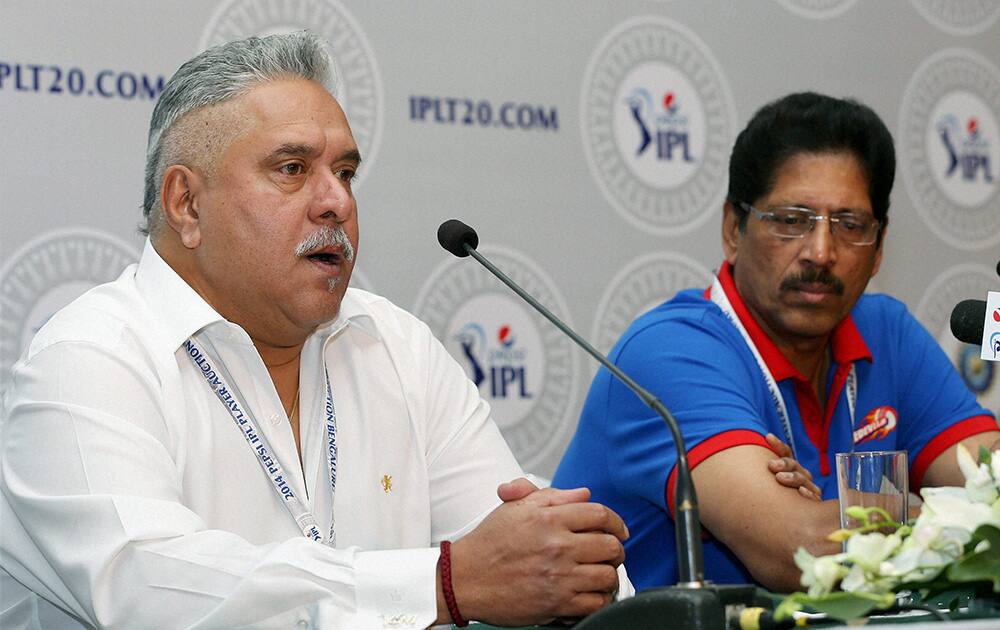 Owner of Royal Challengers Bengaluru, Vijay Mallya with T S Sekhar of Delhi Daredevils addressing the press during the IPL Auction 2014 in Bengaluru.