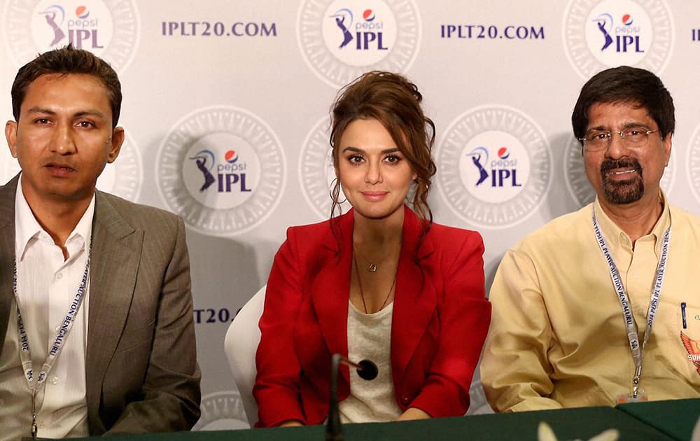 Preity Zinta, Co owner of Kings XI Punjab along with Sanjay Bhangar of the team and Krishnamachari Srikkanth of Sunrisers Hyderabad at a press conference during the IPL Auction 2014 in Bengaluru.