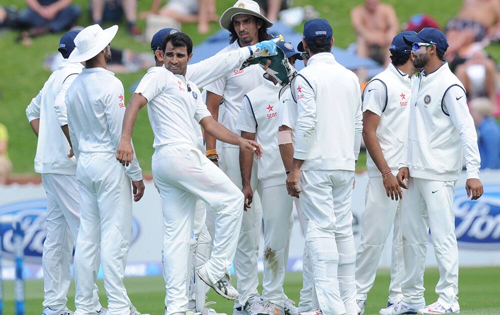 India's Mohammed Shami looks back at the departure of New Zealand's Kane Williamson whose wicket he took for 47 on the first day of the second cricket test in Wellington, New Zealand.