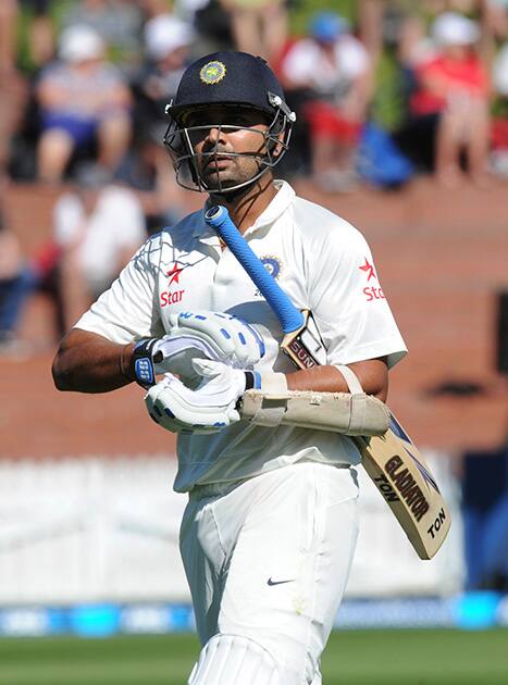 India’s Murali Vijay walks out for 2 off the bowling of New Zealand’s Tim Southee on the 1st day of the 2nd cricket test at Basin Reserve in Wellington, New Zealand.