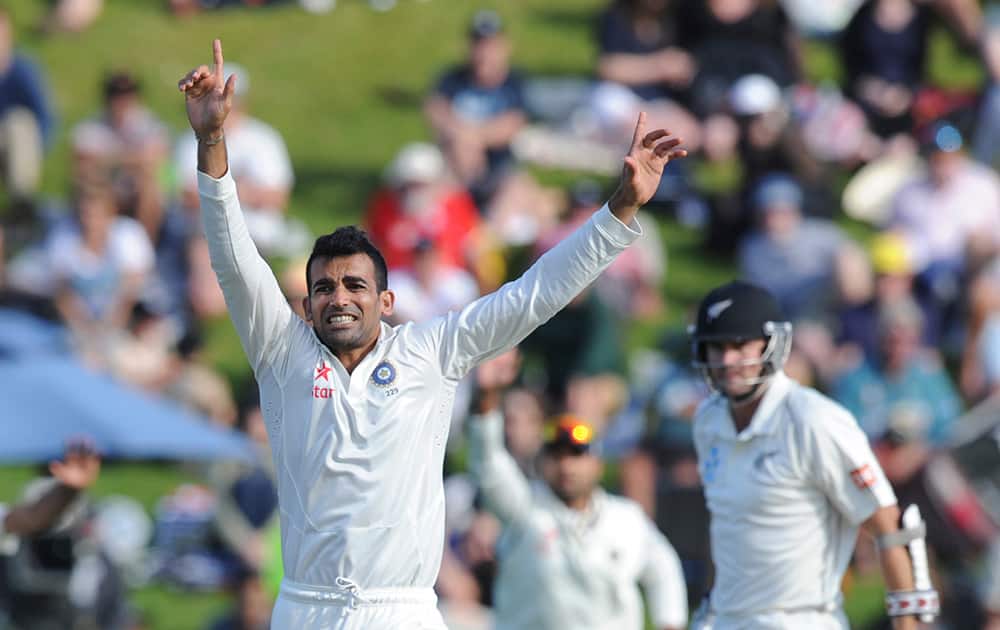 India’s Zaheer Khan celebrates after trapping New Zealand’s Peter Fulton lbw for 1 on the second day of the second cricket test in Wellington, New Zealand.